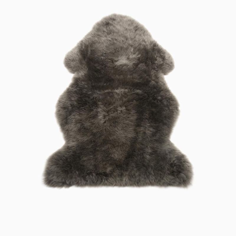 Warmbat Lammfell langhaarig Olive